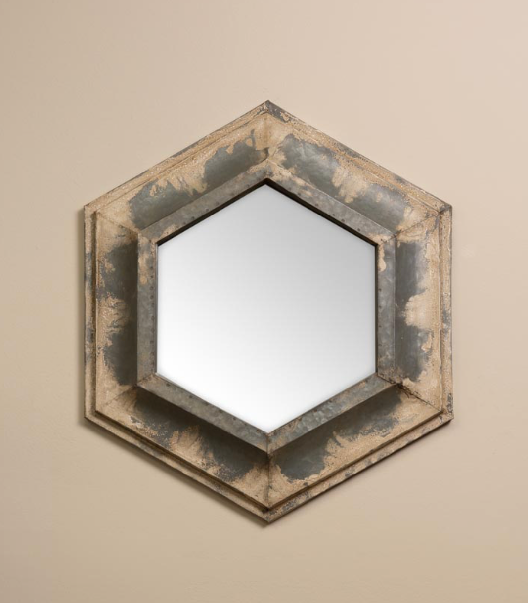 Espejo hexagonal metálico