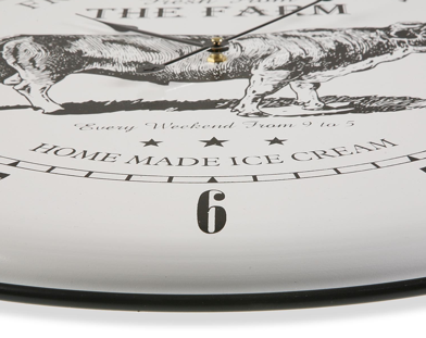 Reloj metálico vaca