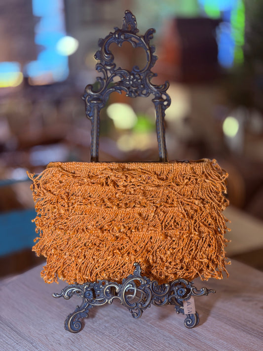 Bolso mano flecos naranja
