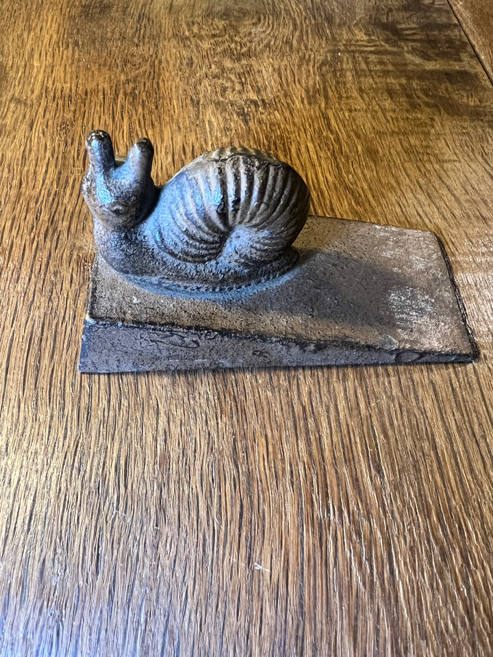 Sujeta puertas metálico Caracol